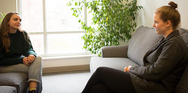 Student talking to counseling at the center