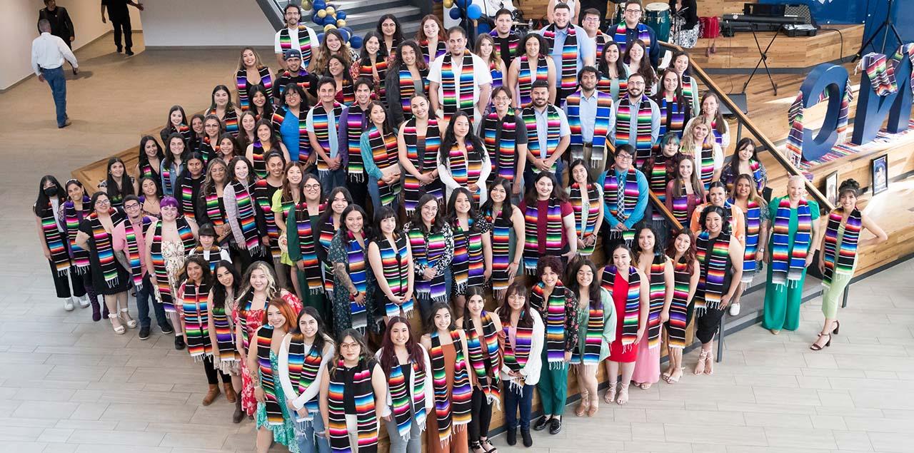 a group of graduating students with sarape stolas