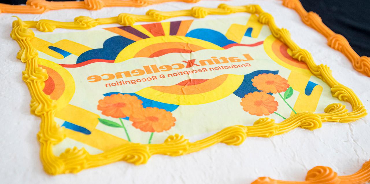 cake with the decoration that reads latinxcellence