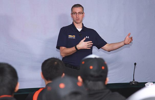 Nichols presenting in front of Chinese youth athletes in Dec. 2018.